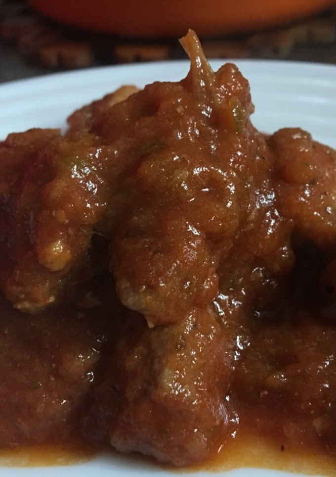 Una foto de Carne con tomate