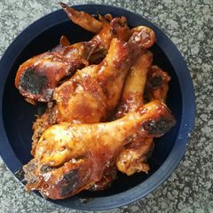 A picture of Honey glazed drumsticks.
