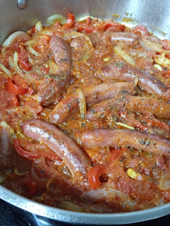 Una foto de Longanizas con tomate