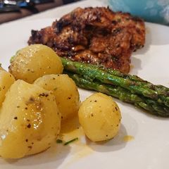 A picture of Baby New Potatoes in Chives and Butter Sauce.