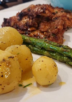A picture of Baby New Potatoes in Chives and Butter Sauce.