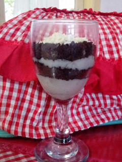 A picture of Oreo Cheese Cake in A Glass.
