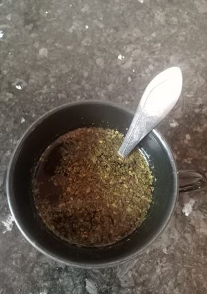 A picture of Mint and Lemon Water with Dried Mint Powder.