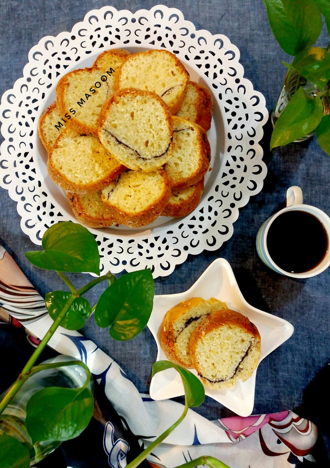 عکسی از دستور کیک ماست با لایه ی نارگیلی شکلاتی