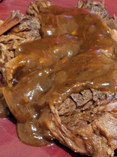A picture of Left over beef pot roast (beef and noodles).