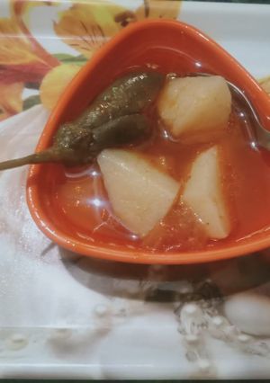 A picture of Potatoes And brinjal egg plant veg.