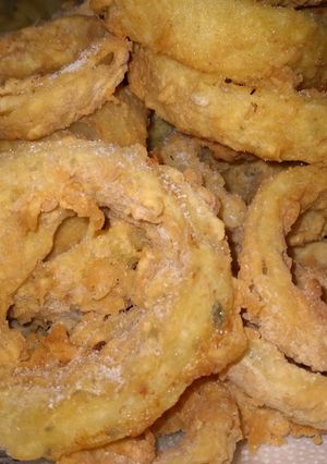 Una foto de Aritos de cebolla!!!😋😋