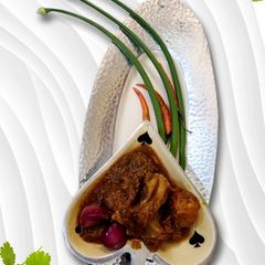 A picture of Chicken gravy masala.