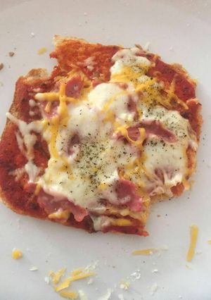 Una foto de Mini pizza de pan para los peques