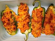 A picture of sausage stuffed jalapeno