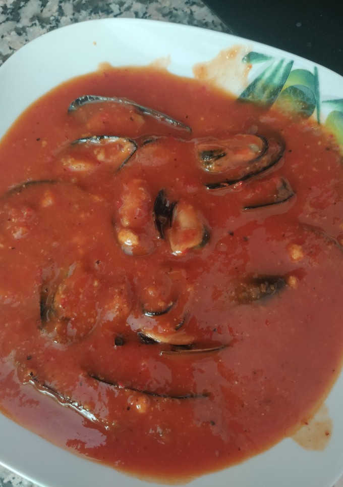 Una foto de Mejillones en salsa de tomate