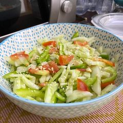A picture of Quick Soy Sauce Lemon Sesame Oil Dressing with Cucumber Tomato Capsicum Salad.