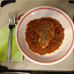 A picture of Chicken Breasts with Spanish Rice and Quinoa.