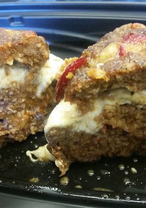 A picture of Roasted Bell Pepper & Mozzarella Stuffed Mini Meatloafs.