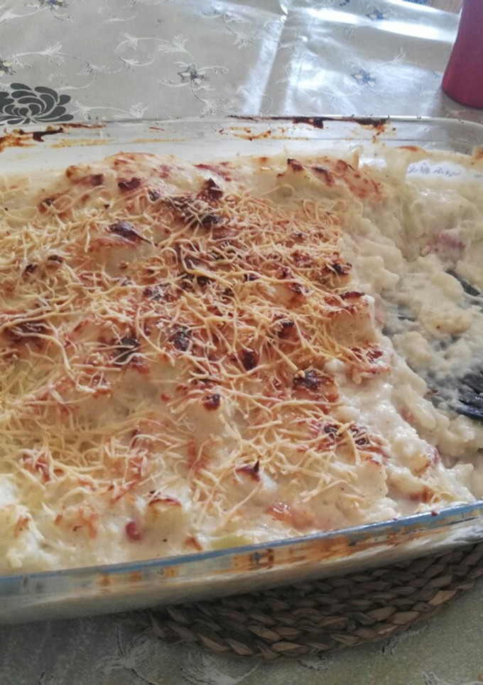 Una foto de Coliflor con patata y bechamel gratinado al horno