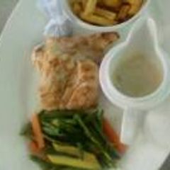 A picture of Grilled sea fish with Chips.