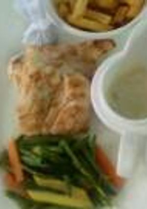 A picture of Grilled sea fish with Chips.