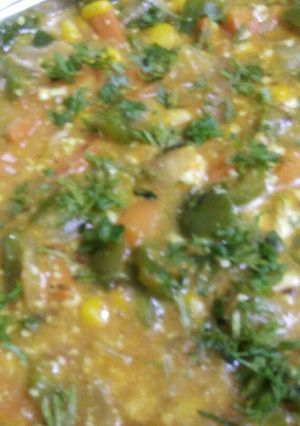 A picture of Mix Veg Paneer Masala in white sauce.