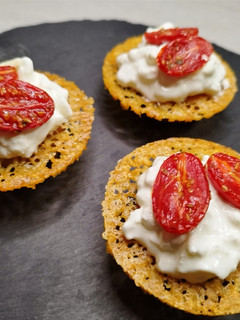 A picture of Parmesan Crusted Bread Bruschetta with Stracciatella and Confit Tomatoes 🍅🧀🥖.