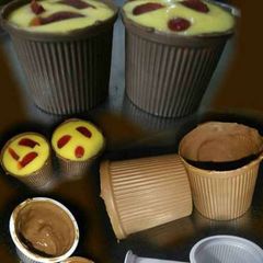 A picture of Mango Ras in edible chocolate cups.