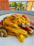Tagliatelle ai funghi e pomodorini