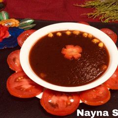 Red tomatoes carrot soup A picture of Red tomatoes carrot soup.