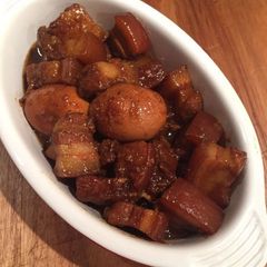 A picture of Babi Kecap(Indonesian Braised Pork Belly in a Sweet Soy Sauce).