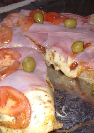 Una foto de Pizza integral porteña