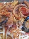 Spaghetti con salsa de mariscos