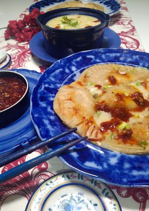 A picture of Dumplings With Noodles Soup.