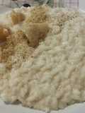 Risotto al parmigiano, con noci, pepe e cialde di grana
