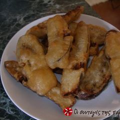 A picture of Fried eggplants with batter.