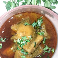 A picture of Green coriander & potato curry.