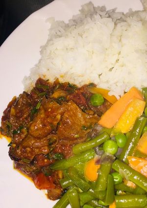 A picture of Rice and beef wet fry.