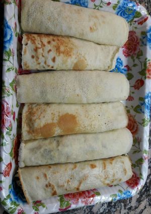 Una foto de Canelones de ricota, verdura, jamón y queso