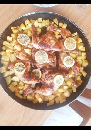 A picture of Baked chicken and potatoes.