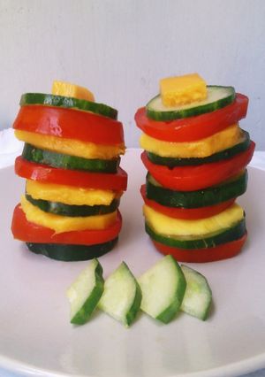 A picture of Tomato Mango Cucumber Salad Towers.
