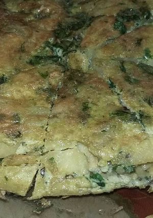 Una foto de Tortilla de papa y espinaca