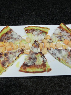 Una foto de Tortilla francesa verdosa con parmesano
