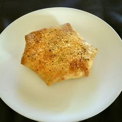 A picture of Rotisserie Chicken Parmesan Crunchwrap.