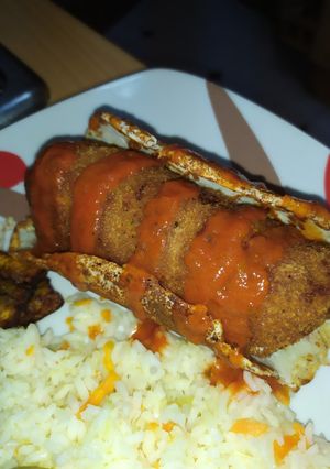 Una foto de Cordón Bleu con filete de vacuno sobre crocante de parmesano