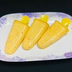 A picture of Alphonso mango cream popsicle /kids favorite dessert.