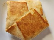 A picture of ground beef and flour tortilla