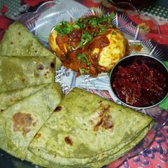 A picture of Palak Roti With Egg Roast.