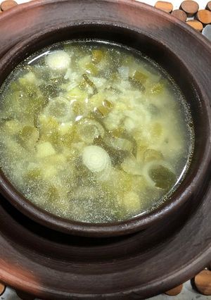 Una foto de Sopa de cebollines