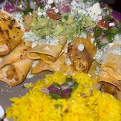 A picture of Air Fryer Loaded Chicken Taquitos.