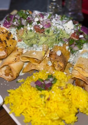 A picture of Air Fryer Loaded Chicken Taquitos.