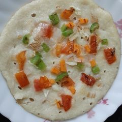 A picture of Uttapam mix veg uttapam.