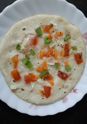 A picture of Uttapam mix veg uttapam.