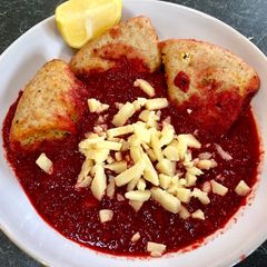 A picture of Borscht (Beetroot Soup) and Dumplings.